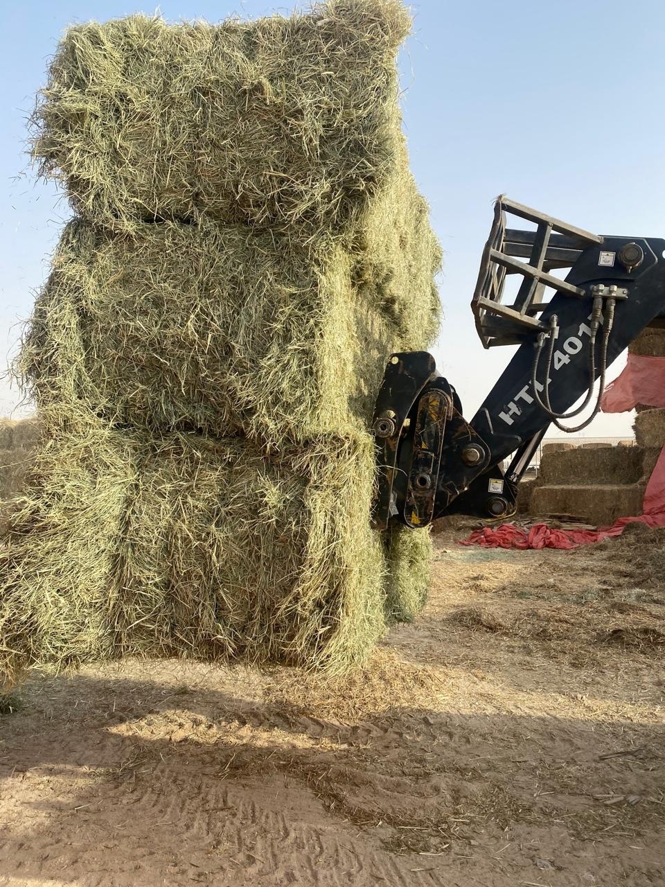Forklift loading fodder bales